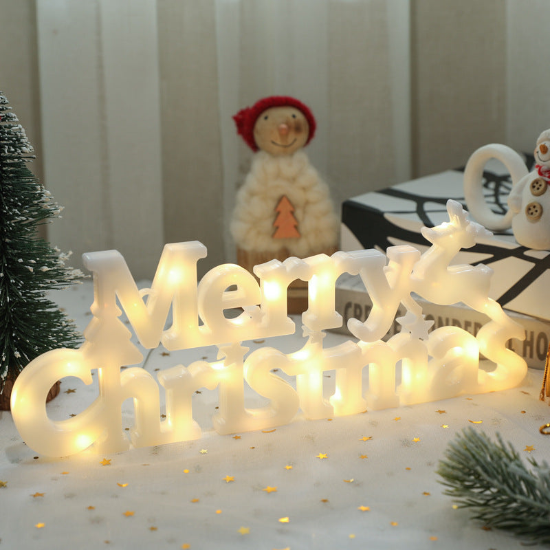 Christmas wreath with colored lights in letters